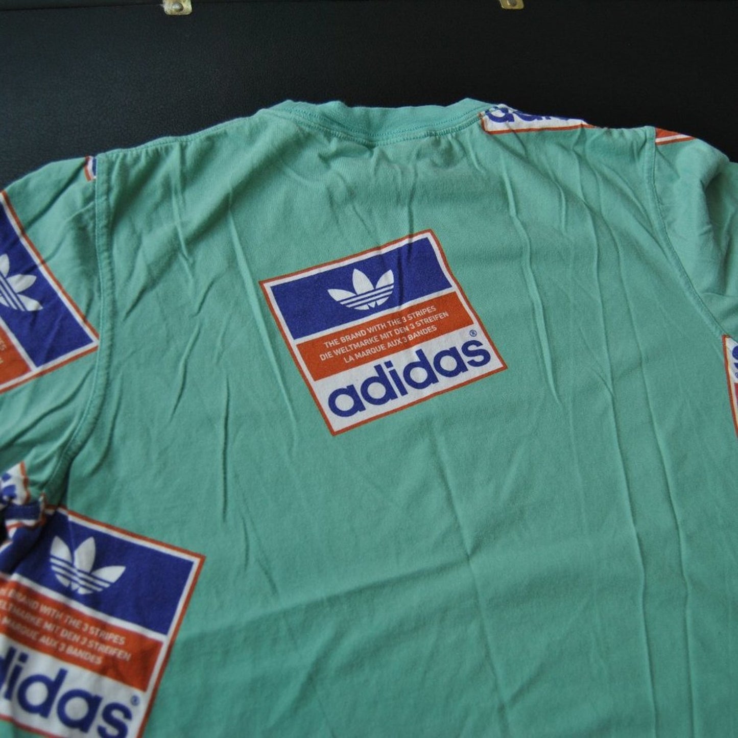 Adidas Repeat Logo Throughout Medium Short Sleeve Shirt