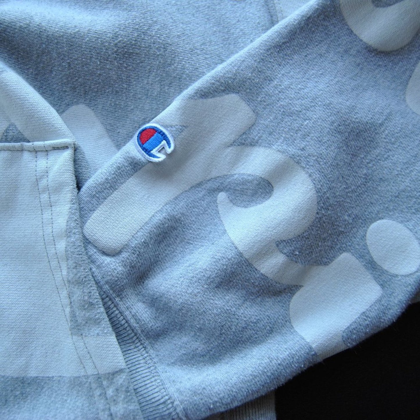 Champion Reverse Weave Large Gray w/ White All-Over Logo Hoodie