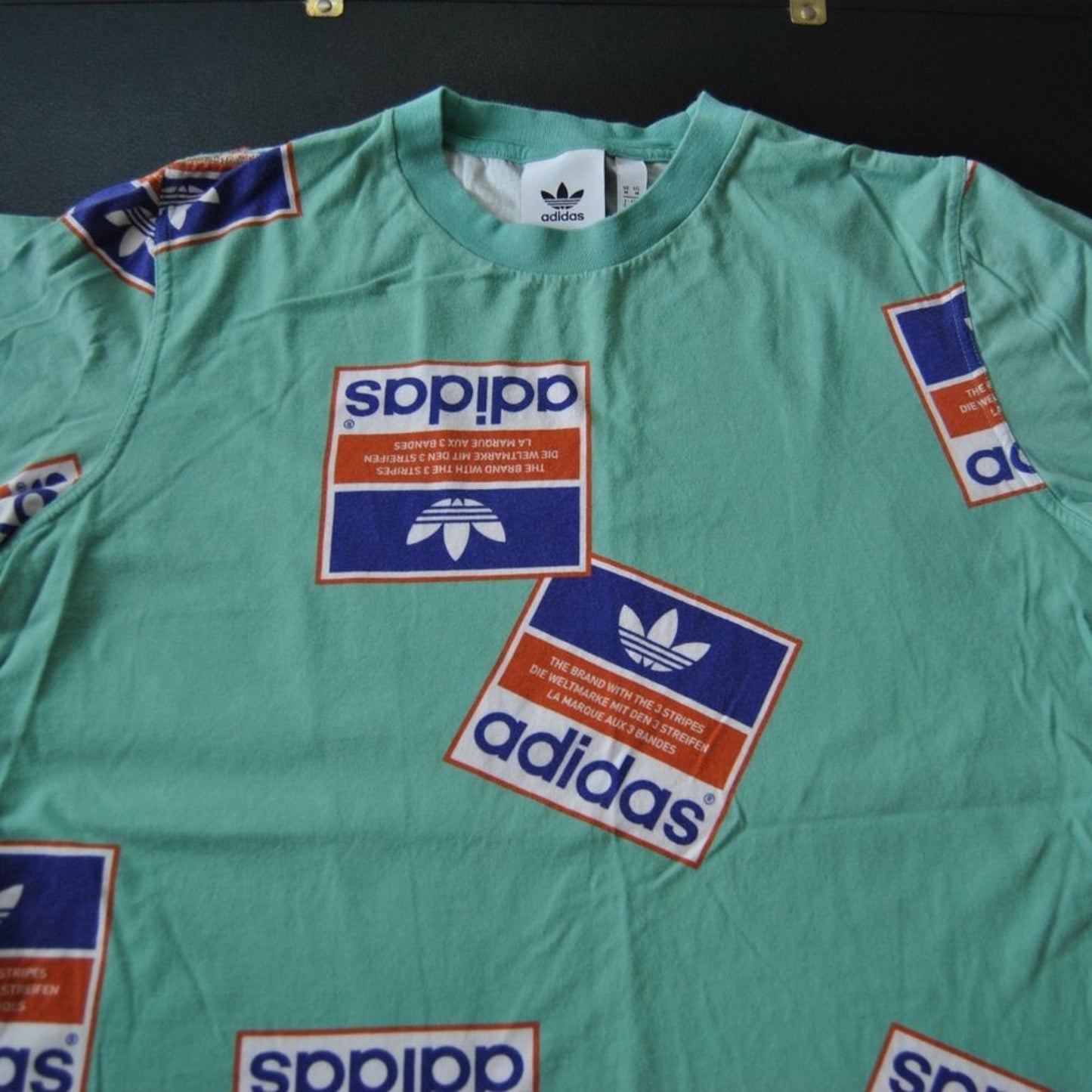 Adidas Repeat Logo Throughout Medium Short Sleeve Shirt